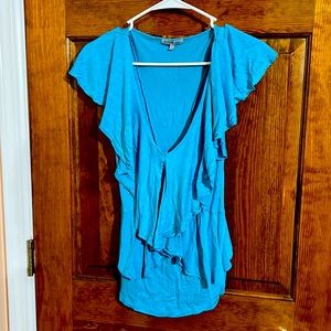 Blue ruffled blouse